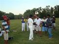 Runners up Cap Siva accepting trophy from OCC Caps.JPG